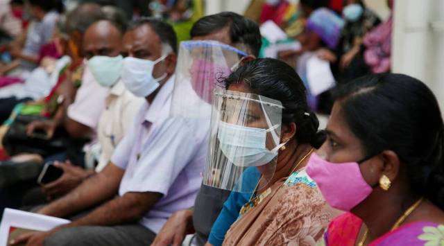People wait to be inoculated against Covid-19 at a vaccination centre in Chennai. (PTI Photo/File)