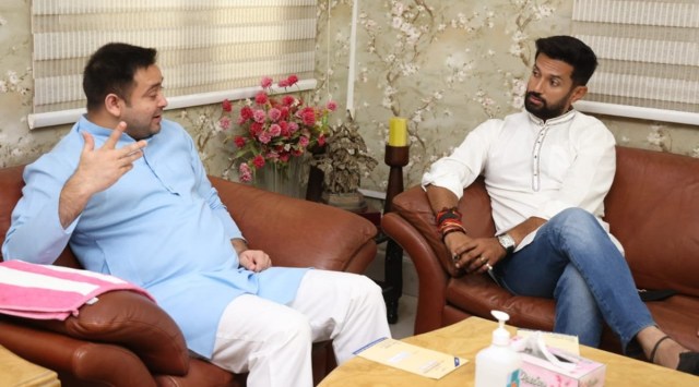 LJP leader Chirag Paswan (R) with RJD leader Tejashwi Yadav (L). (Photo: ANI)