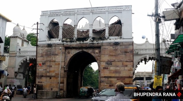 Slab of historical Lehripura gate in Vadodara fell down. (Express Photo by Bhupendra Rana)