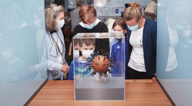 ÒHere and Today,Ó a 2020 sculpture by Sebastian Wien of an artistic interpretation of the COVID-19 virus at the German Hygiene Museum in Dresden, Aug. 22, 2021. The collection of the German Hygiene Museum shows that the same debates recur whenever disease breaks out, even if we donÕt remember them. (Image/The New York Times)