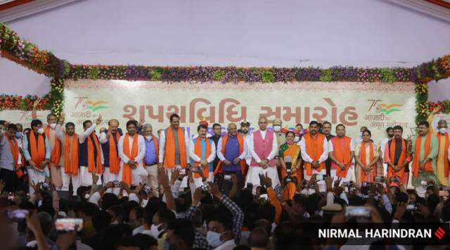 The 24 ministers sworn in to Gujarat CM Bhupendra Patel's cabinet Thursday. (Express photo by Nirmal Harindran)
