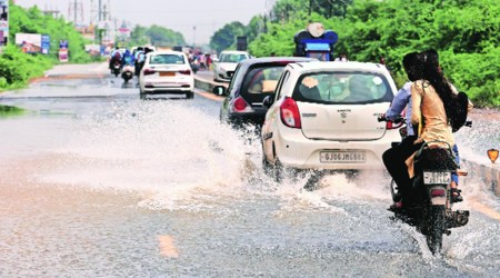 A water-logged road in Vadodara. (Express Photo by Bhupendra Rana)