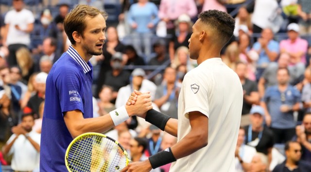 Daniil Medvedev (L) shakes hands with Felix Auger-Aliassime (R) after their US Open semi-final. (USA Today)