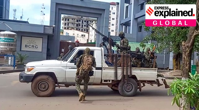 Soldiers patrol in a vehicle near the office of the president in the capital Conakry, Guinea Sunday, Sept. 5, 2021. (AP Photo)