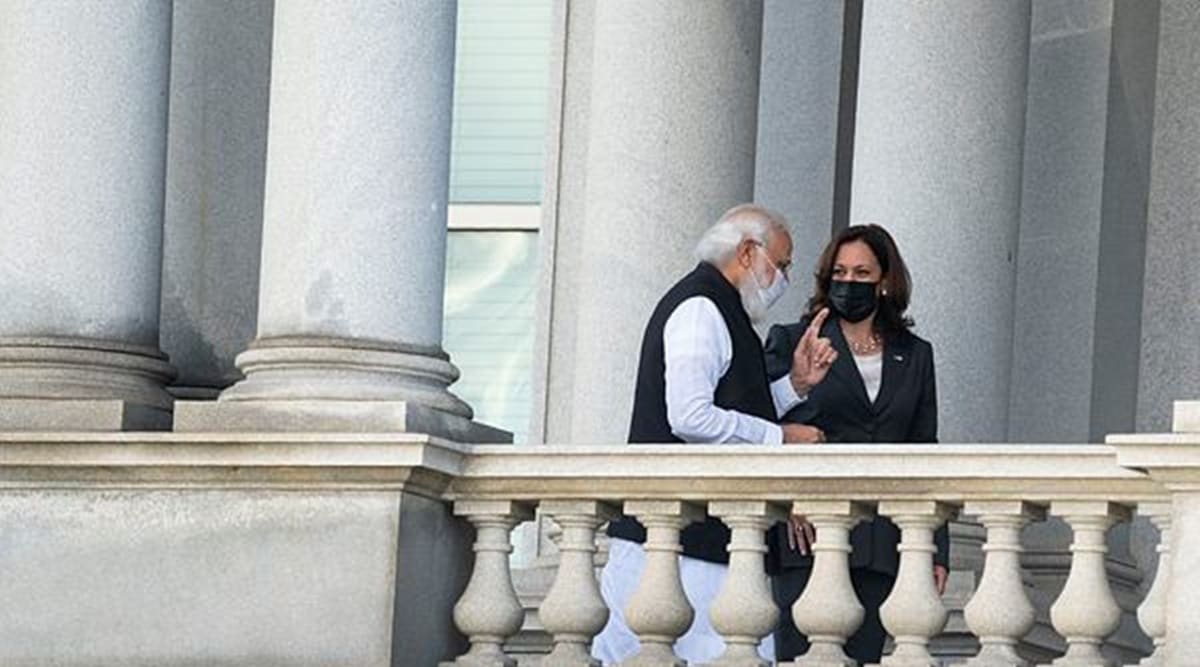 US Vice President Kamala Harris talks with Indian Prime Minister Narendra Modi on the balcony of the Eisenhower Executive Office Building, Thursday, Sept. 23, 2021, in Washington. (AP/PTI)