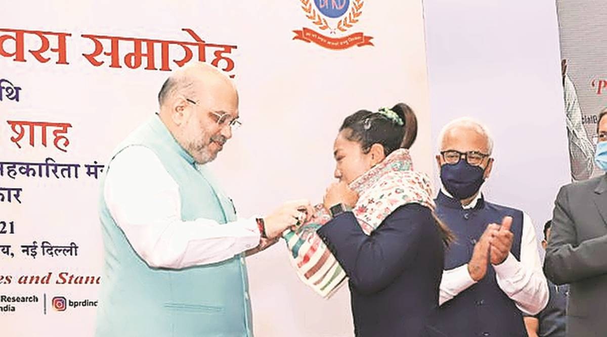 Shah with Olympics silver medallist Saikhom Mirabai Chanu at an event to mark the 51st foundation day of the BPR&D in Delhi.  (Twitter/AmitShah)