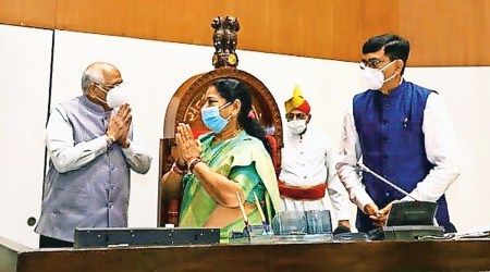 Dr Nimaben Acharya is congratulated by CM Bhupendra Patel at Vidhan Sabha on Monday. (Source: Twitter/CMO Gujarat)