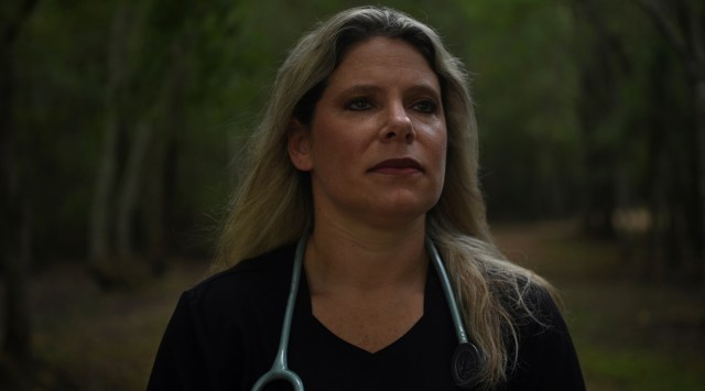 Jennifer Bridges, 39, an RN who was fired from her job after refusing the coronavirus disease (COVID-19) vaccine, poses for a portrait at Jenkins Park in Baytown, Texas, U.S., September 30, 2021. (Reuters)