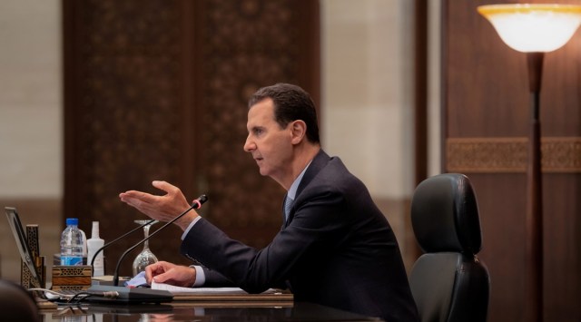 Syrian President Bashar al-Assad speaks at a meeting of his cabinet in Damascus, Syria. (Reuters/File)
