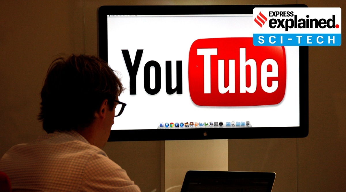 A visitor is seen at the YouTube stand during the annual MIPCOM television programme market in Cannes (Reuters)