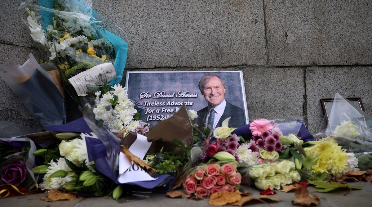 Floral tributes to British MP David Amess, who was stabbed to death during a meeting with constituents, lay outside the Houses of Parliament, in London, Britain, October 19, 2021. (Reuters)