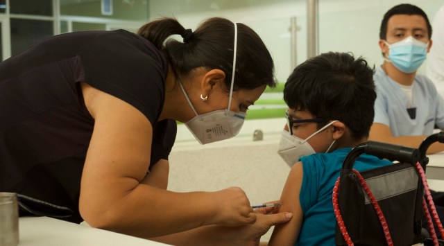 esearchers tested two shots for the 6- to 11-year-olds, given a month apart, that each contained half the dose given to adults. (AP)