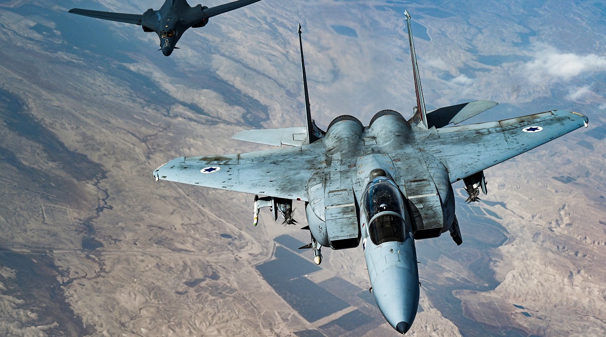 In this photo released by the US Air Force, an Israeli Air Force F-15 Strike Eagle flies in formation with a US Air Force B-1B Lancer over Israel as part of a deterrence flight. (AP)