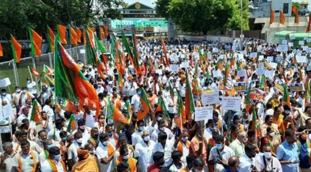 Hundreds of BJP workers gathered and raised slogans against the DMK government and claimed it is showing spiritual animosity by restricting the public from worshiping on weekends.