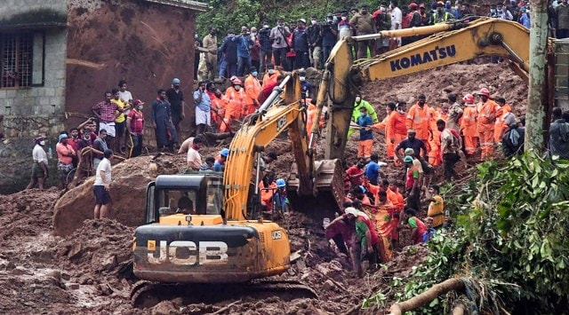 NDRF team during a rescue operation at Poovanchi hill in Kottayam district on Sunday. (Photo: PTI)