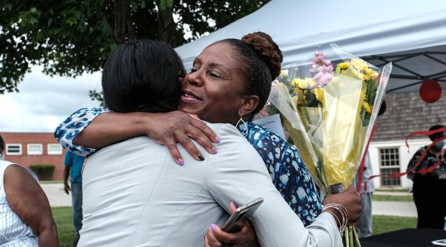 Andrea Kane gets a hug on her last day as superintendent of schools in Queen Anne's County, in Centreville. (Michael A. McCoy/The New York Times)