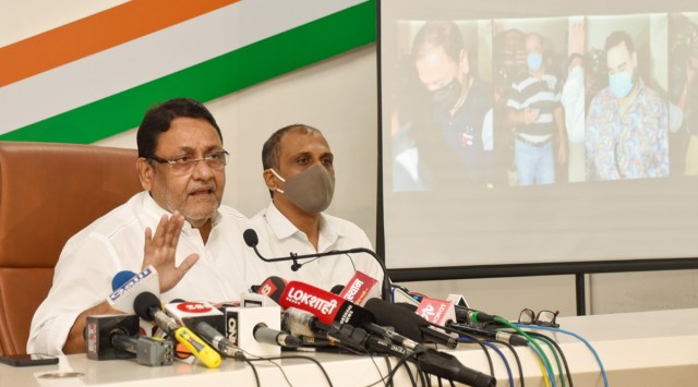 NCP leader Cabinet minister of Maharashtra Nawab Malik addressing a press conference. (Express photo)