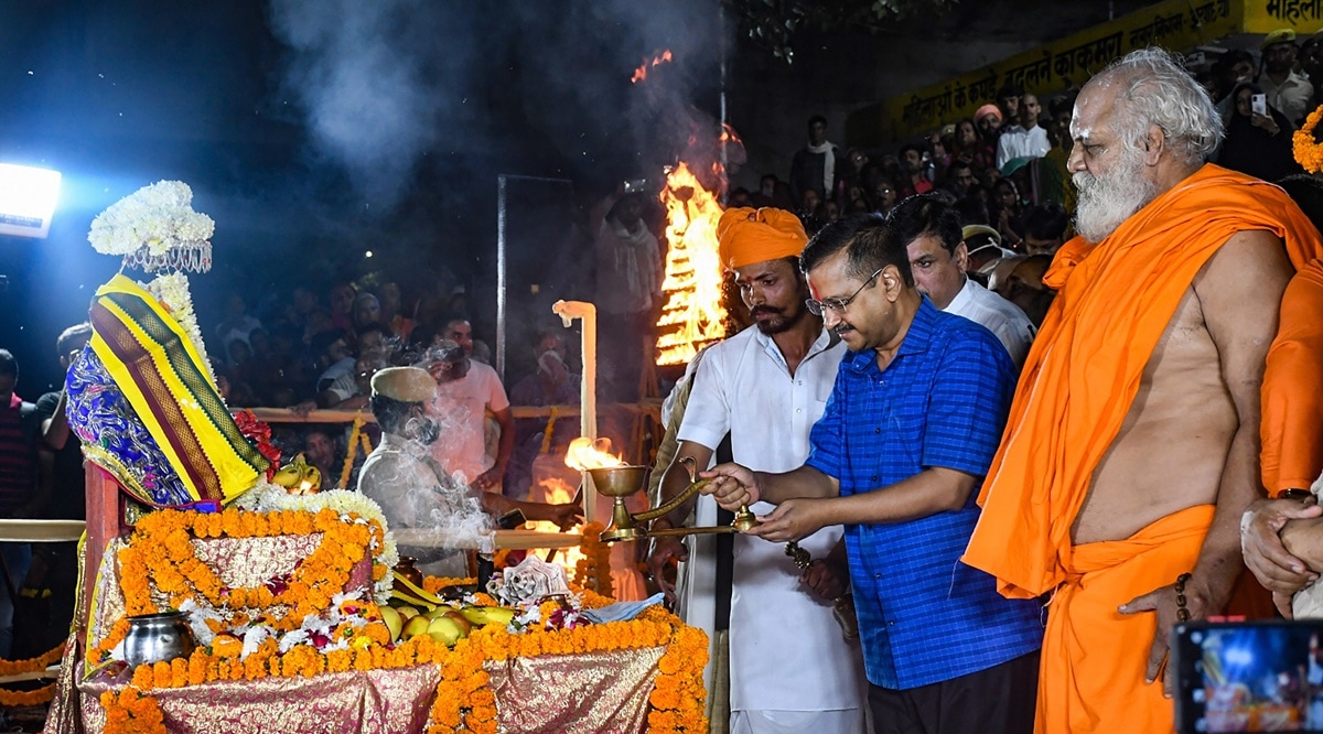 Delhi Chief Minister and AAP national convener Arvind Kejriwal performs 'Aarti' at Saryu Ghat in Ayodhya, Monday, Oct. 25, 2021. (PTI Photo)