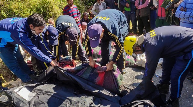 Police and SDRF personnel carry out rescue work after a vehicle fell into a deep gorge at the Byla village, Chakrata in Dehradun district, Sunday, Oct 31, 2021. (PTI Photo)