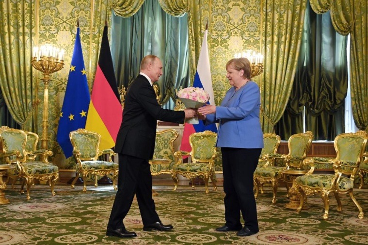 Angela Merkel, germany, merkel, fukushima, climate change, migration crisis, putin, russia, china, orban, hungary, poland, german elections, cdu, bundestag, Angela Merkel news, germany news, world news, current affairs, Indian Express