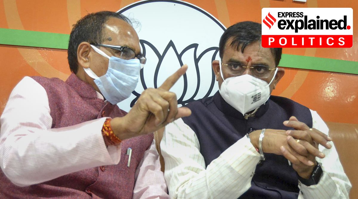 Madhya Pradesh Chief Minister Shivraj Singh Chouhan and BJP State President VD Sharma during BJP State Election Management Committee meeting ahead of the by-polls, at BJP Headquarters in Bhopal, Friday, Oct. 29, 2021. (PTI Photo)
