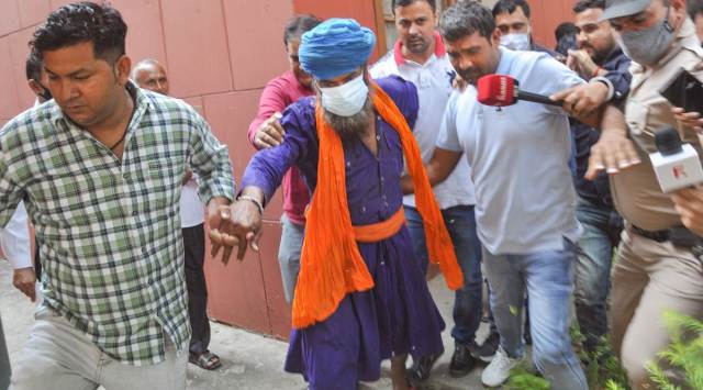 Sarabjit Singh being produced before a court in Sonipat last Saturday. (PTI)