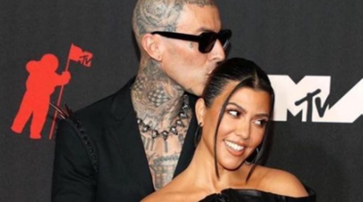 Kourtney Kardashian Cozies Up to Travis Barker While He Gets Tattoo