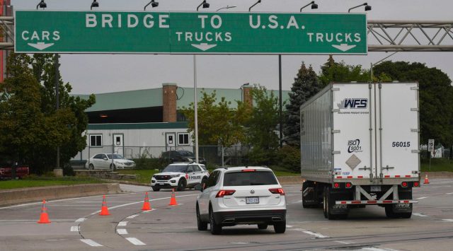 Traffic moves on the Ambassador Bridge border crossing in Windsor, Ontario, Monday, Oct.4, 2021. (Rob Gurdebeke/The Canadian Press via AP)