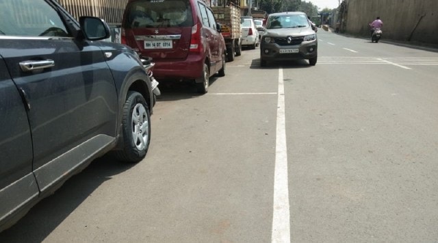 In the last one month or so, parking in the allotted space has dropped drastically. Adding to the woes, more than 100 employees appointed by the contractor have left the job. (Express photo)