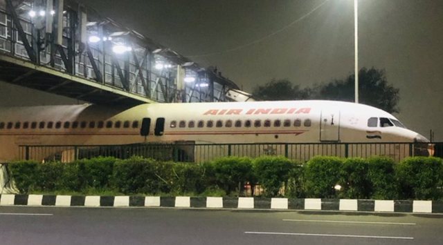 air india, air india plane stuck, scrapped air india plane stuck overbridge, plane stuck under bridge gurugram, viral videos, delhi news, indian express