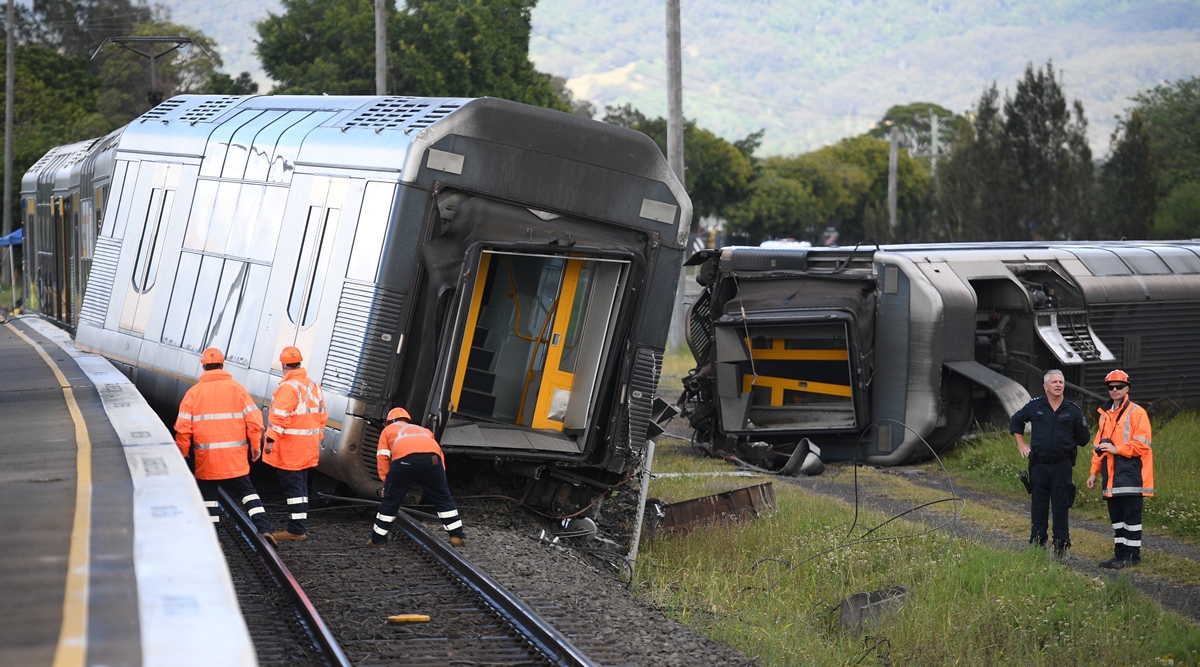 A derailed passenger train is seen after it hit a car on a level crossing in Kembla Grange, Australia on Oct 20, 2021. (Reuters)