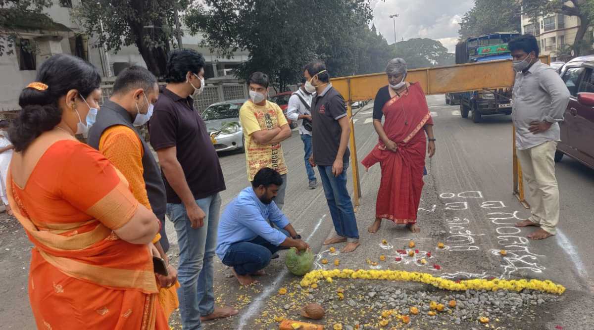 Bengaluru: KRS workers perform 'pothole puja' to 'shame' authorities |  Bengaluru news