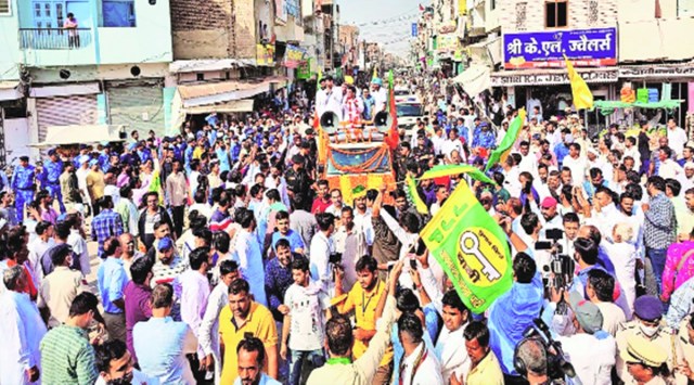 Deputy CM Dushyant Chautala campaigns for BJP's Gobind Kanda in Ellenabad. (Express photo)