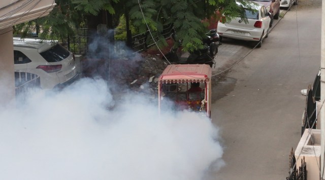 File photo of fumigation being conducted amid an uptick in cases. (Express photo)