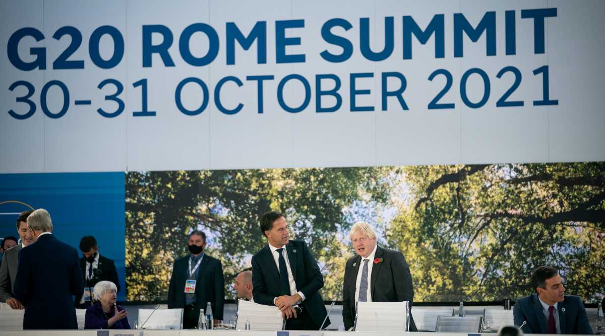 The Netherlands' Prime Minister Mark Rutte speaks with Britain's Prime Minister Boris Johnson as they attend the G20 Summit at the La Nuvola conference centre in Rome, Italy October 31, 2021. (Photo: Pool via REUTERS)