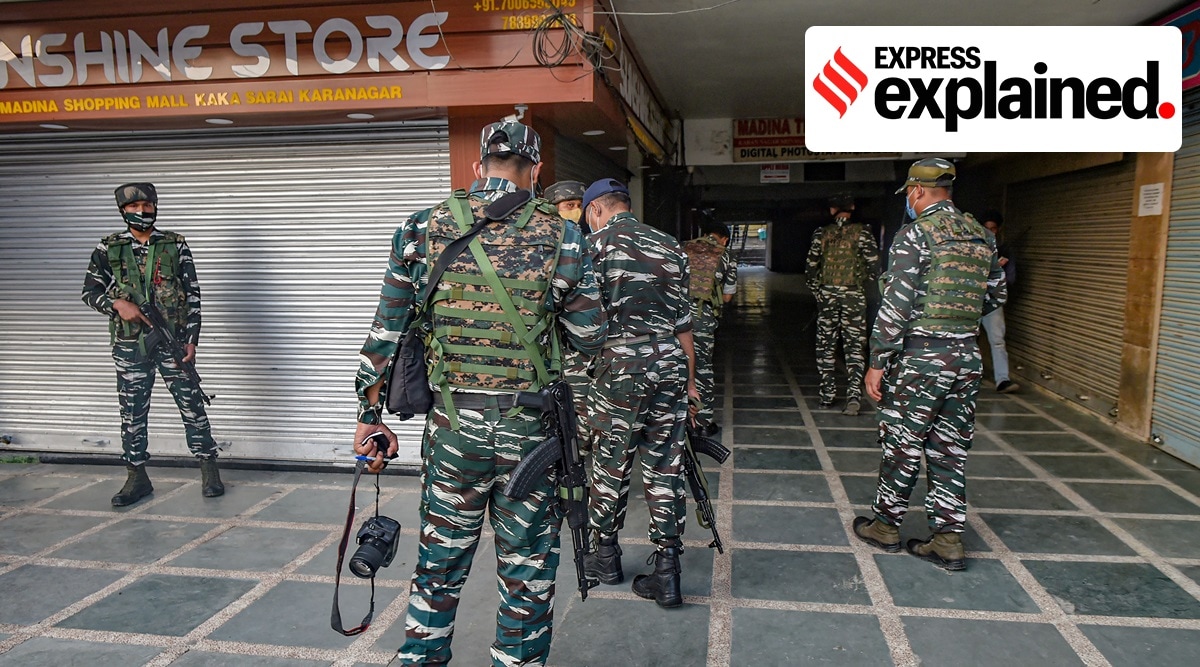 Security personnel prepare for a search operation after a civilian was killed in a shopping complex in Srinagar, Saturday, Oct. 2, 2021. (PTI Photo/S. Irfan)