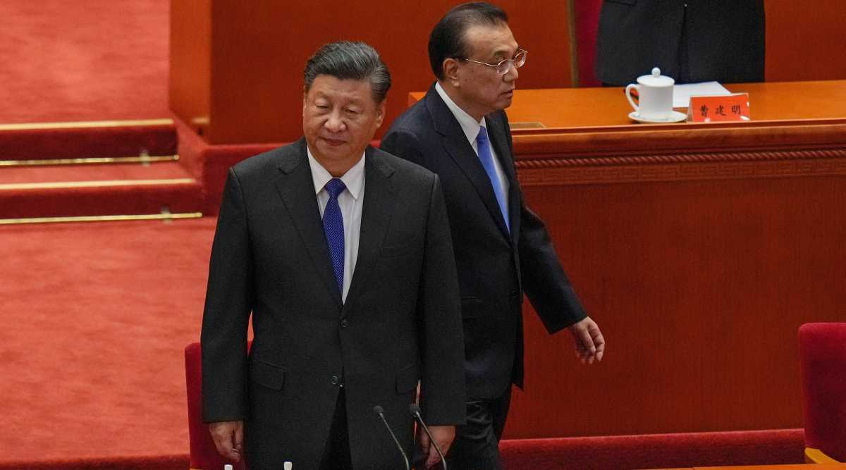 Beijing : Chinese President Xi Jinping, left, and his Premier Li Keqiang arrive at an event commemorating the 110th anniversary of Xinhai Revolution at the Great Hall of the People in Beijing, Saturday, Oct. 9, 2021. Xi said on Saturday reunification with Taiwan must happen and will happen peacefully, despite a ratcheting-up of China's threats to attack the island. (AP/PTI Photo)