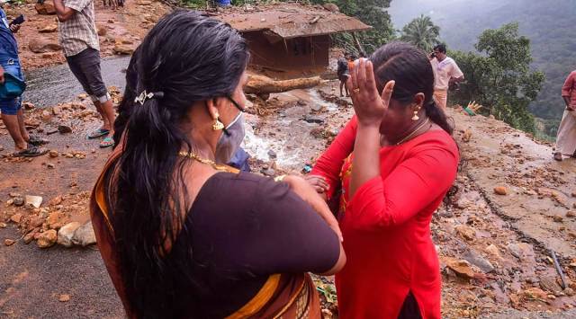 A woman, whose house was damaged in a landslide, at Plappally in Kottayam district. (PTI)