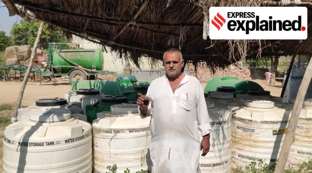 Farmer Paramjit Singh with 20,000 prepared Bio Enzymes in his field at village Maujgarh in Fazilka