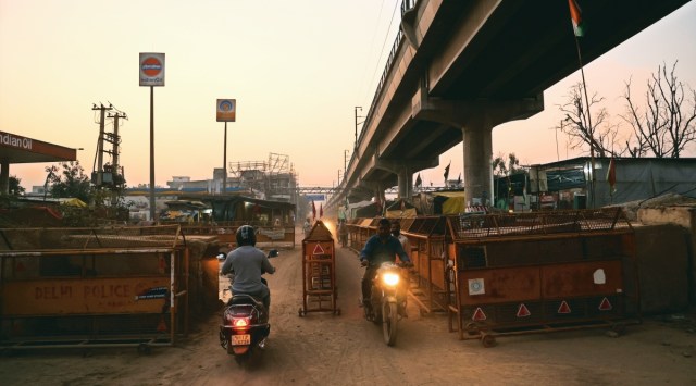 Farm leaders said they had agreed to allow passage of two-wheelers, pedestrians, and ambulances from 7 am to 8 pm till November 6. (Express Photo by Amit Mehra)