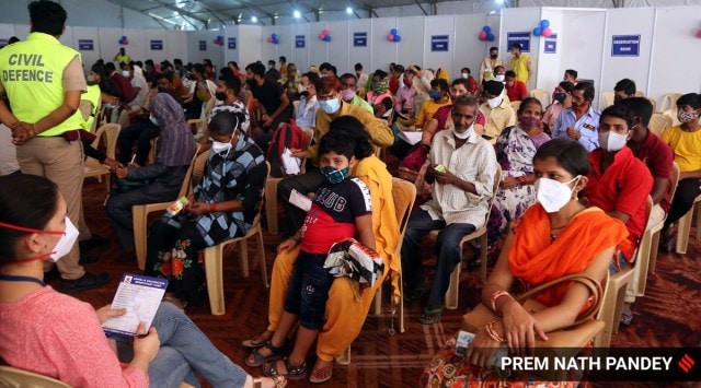 Beneficiaries at a vaccination camp organized by the Delhi government at Matasundri college in New Delhi. (Express photo by Prem Nath Pandey) 