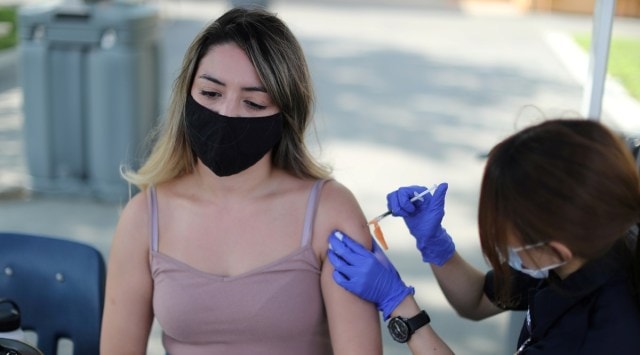 Julissa Vasquez, 23, receives a Covid-19 vaccination as part of a vaccine drive in Los Angeles, California, US. (Reuters/File Photo)