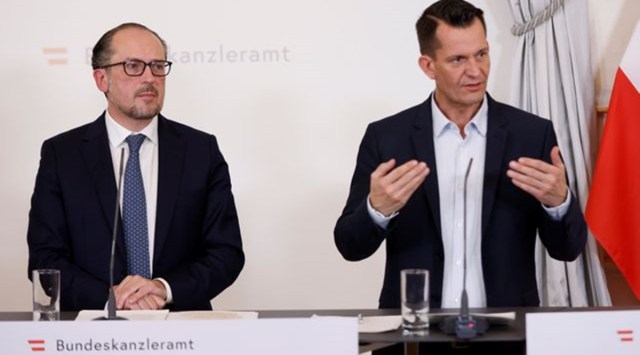 Austrian Chancellor Alexander Schallenberg and Health Minister Wolfgang Mueckstein (Reuters)