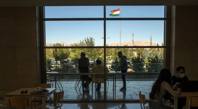 Students relax in the cafeteria of the American University of Iraq in Sulaimaniyah, Iraq, on Nov. 7, 2021, where 109 Afghan students are now studying. (Laura Boushnak/The New York Times)