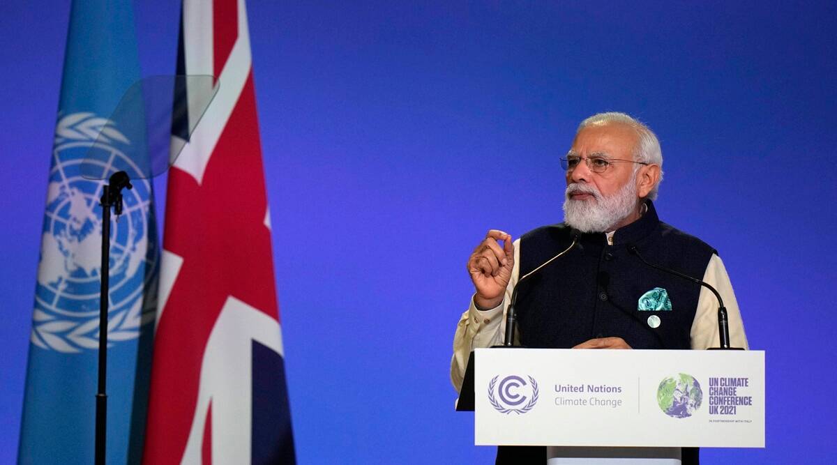 Prime Minister Narendra Modi gestures as he makes a statement at the COP26 UN Climate Summit in Glasgow, Scotland. (AP)