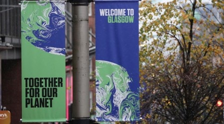 Banners are displayed in central Glasgow (AP)