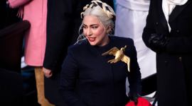 Lady Gaga, Lady Gaga fashion, Lady Gaga British Vogue, Lady Gaga iconic dresses, Lady Gaga old looks, Lady Gaga meat dress, Lady Gaga Met Gala look, Lady Gaga Joe Biden inauguration ceremony, indian express news