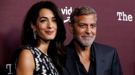 George Clooney with his wife Amal Clooney.  (Photo Reuters/Mario Anzuoni)