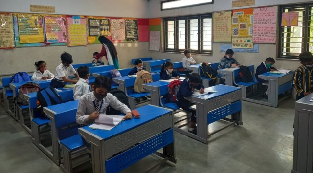 Children attend classes while maintaining all Covid protocols in Delhi. (Express Photo)