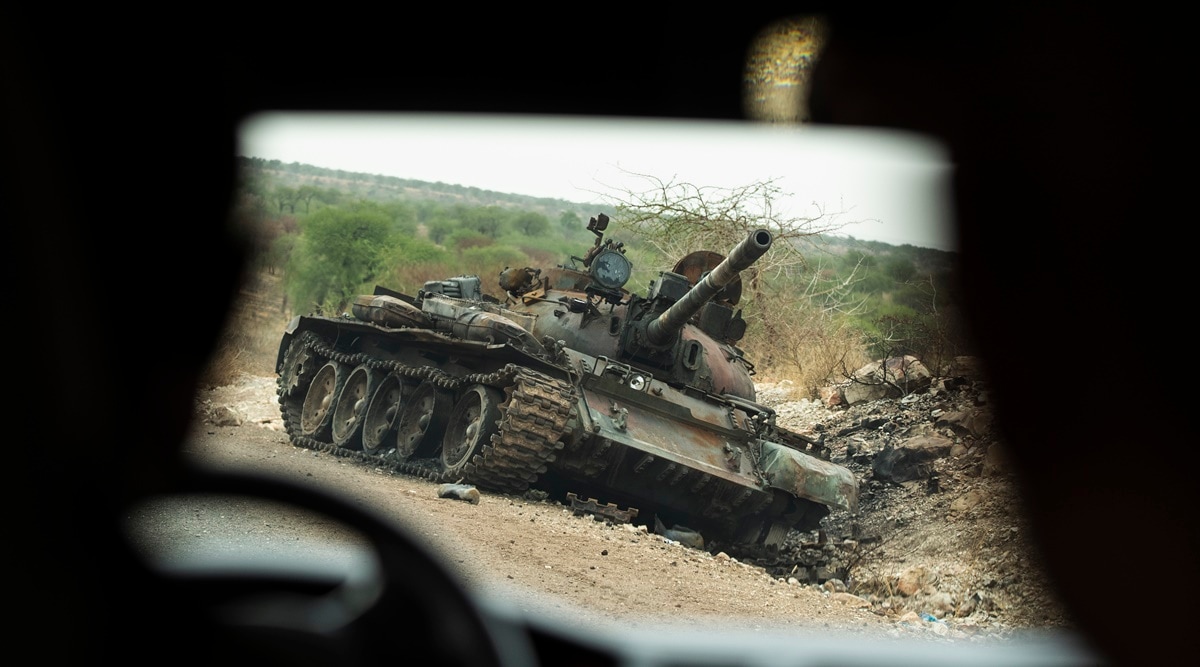 A destroyed tank lies on the side of the road south of Humera, in an area of western Tigray annexed by the Amhara region during conflict, in Ethiopia. (AP)